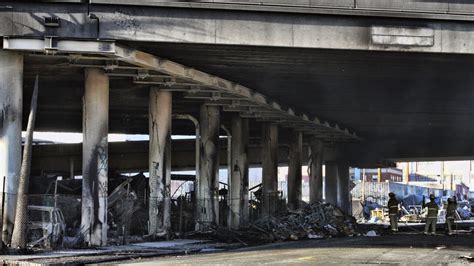 Investigators identify ‘person of interest’ in Los Angeles freeway arson fire
